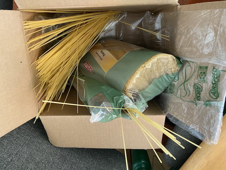 putting noods back in bag ...