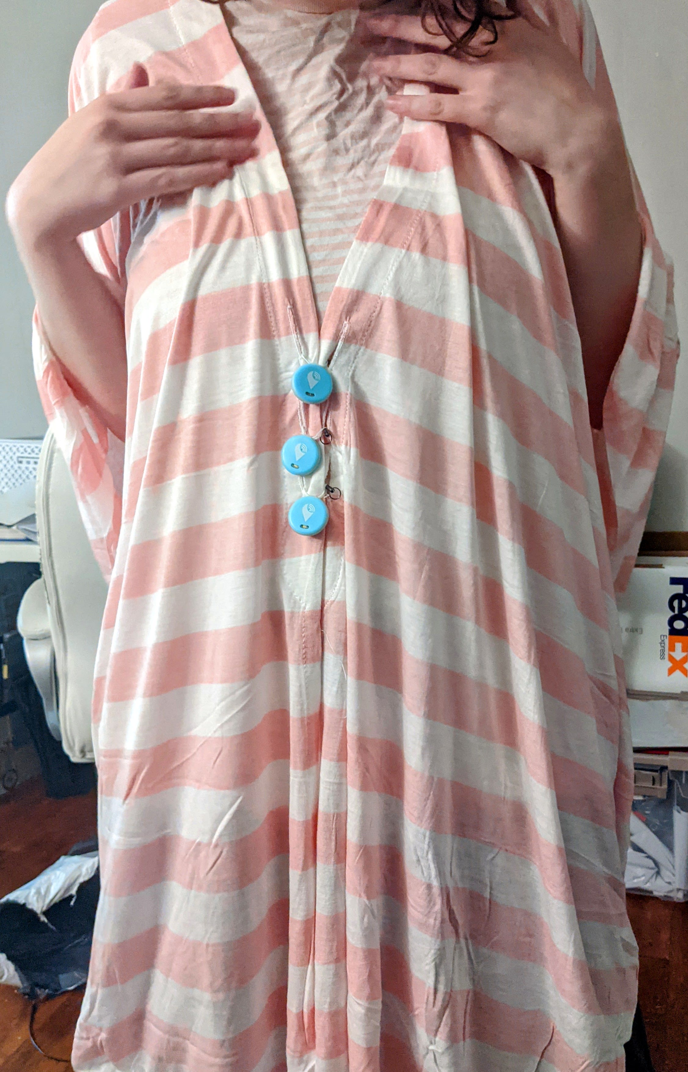 poncho with "buttons"