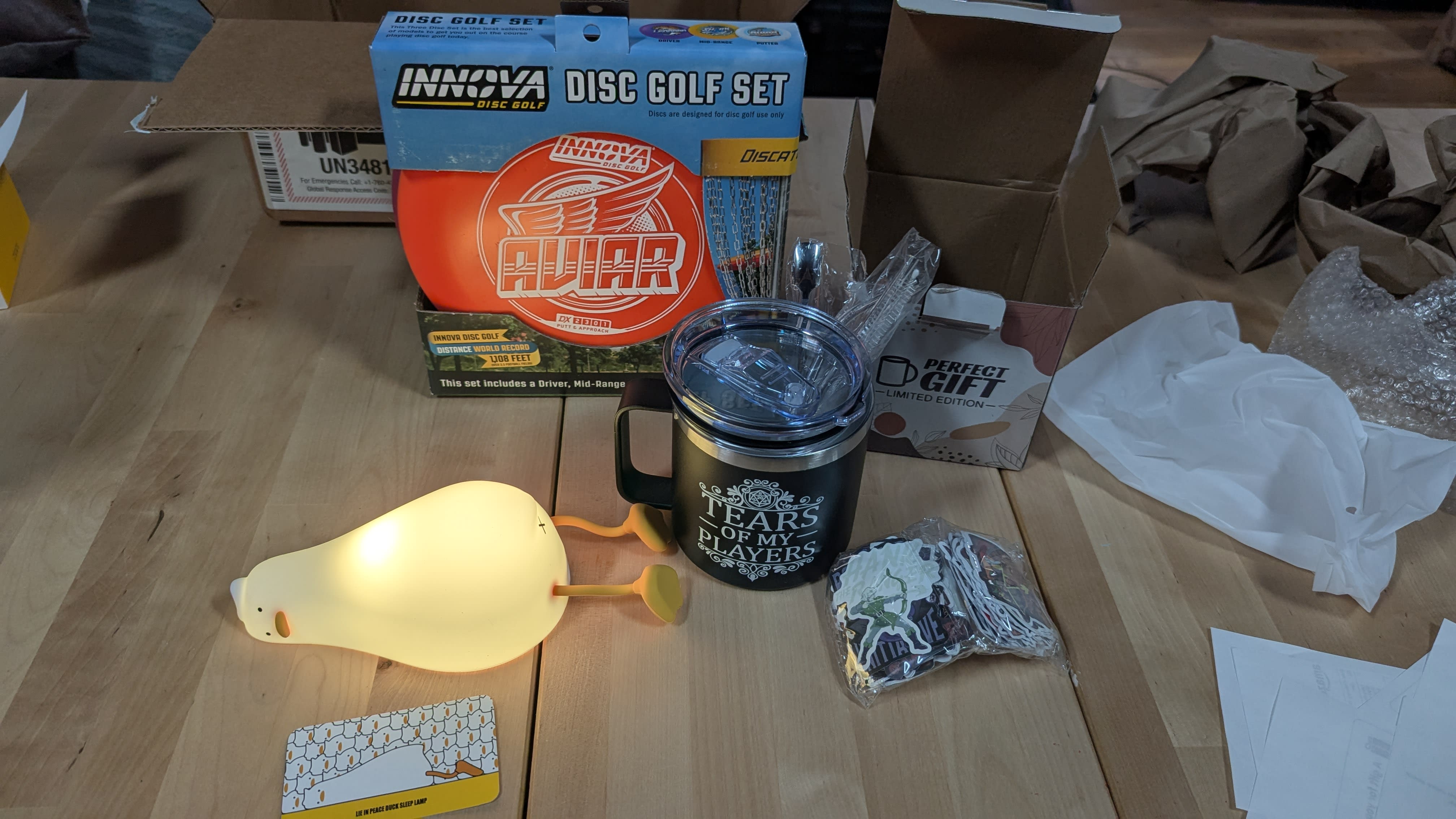 the haul: a sleepy duck, a disc golf starter set, a DnD themed insulated mug and stickers! 