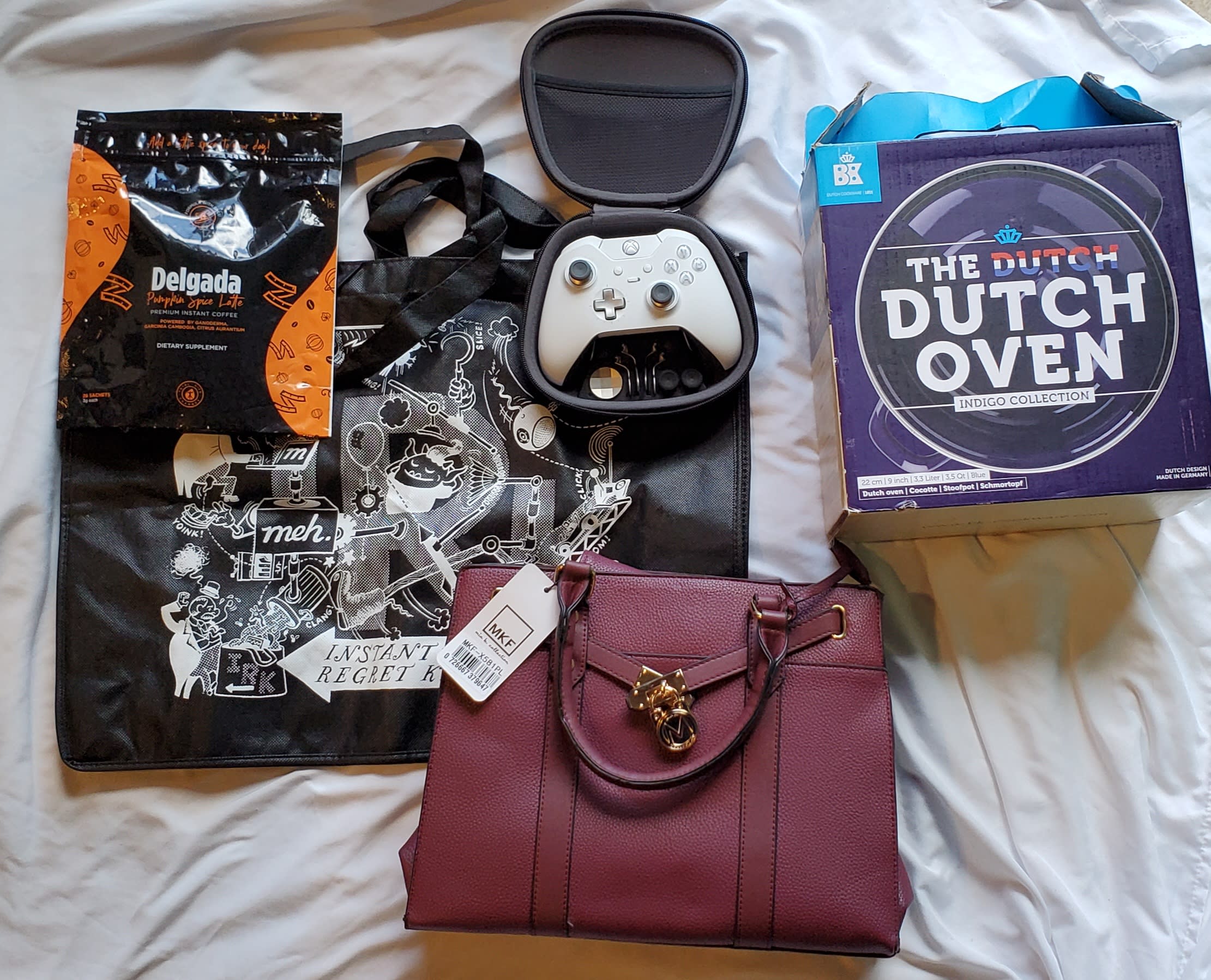 A black IRK bag, a nice purse, some pumpkin spice coffee, a enameled cast iron pot set and a new Xbox Elite controller with all the fixins. Thanks, Meh!