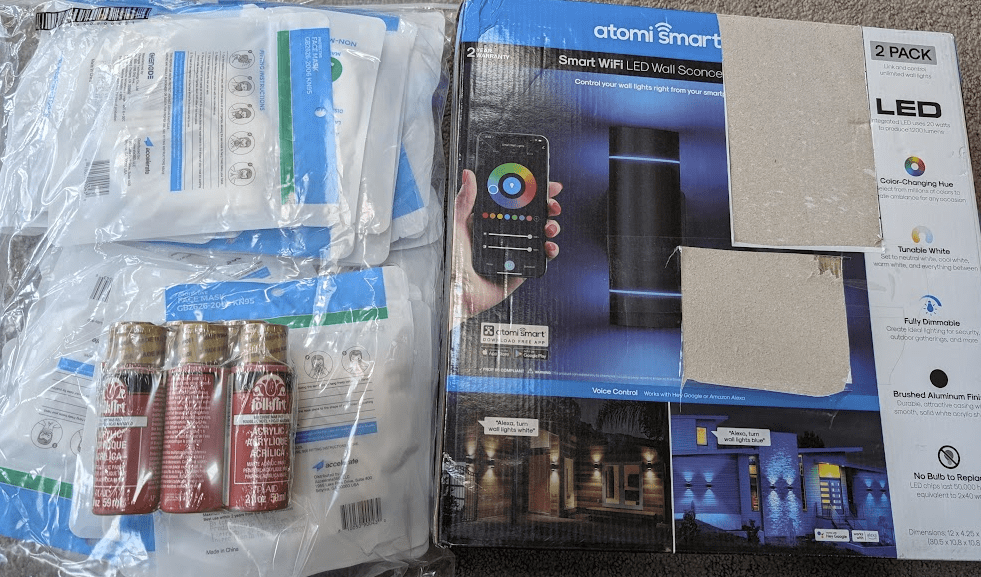 sconce lights, red paint, non-medical masks, yellow bag