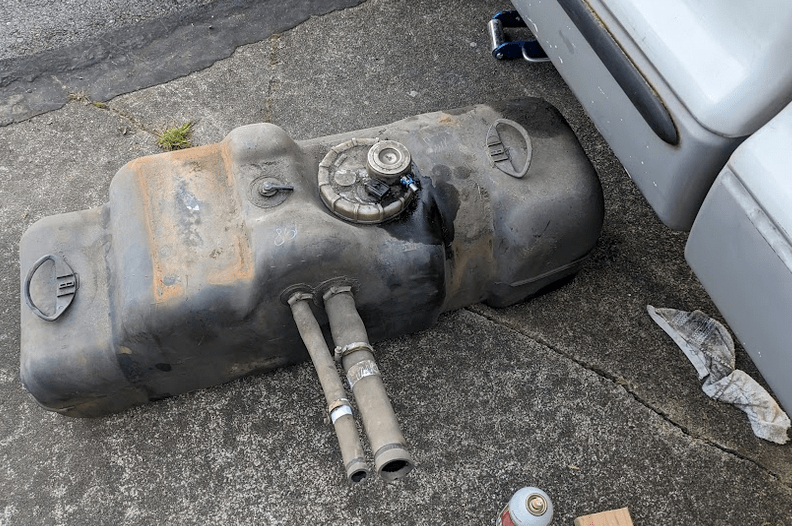 fuel tank beside truck