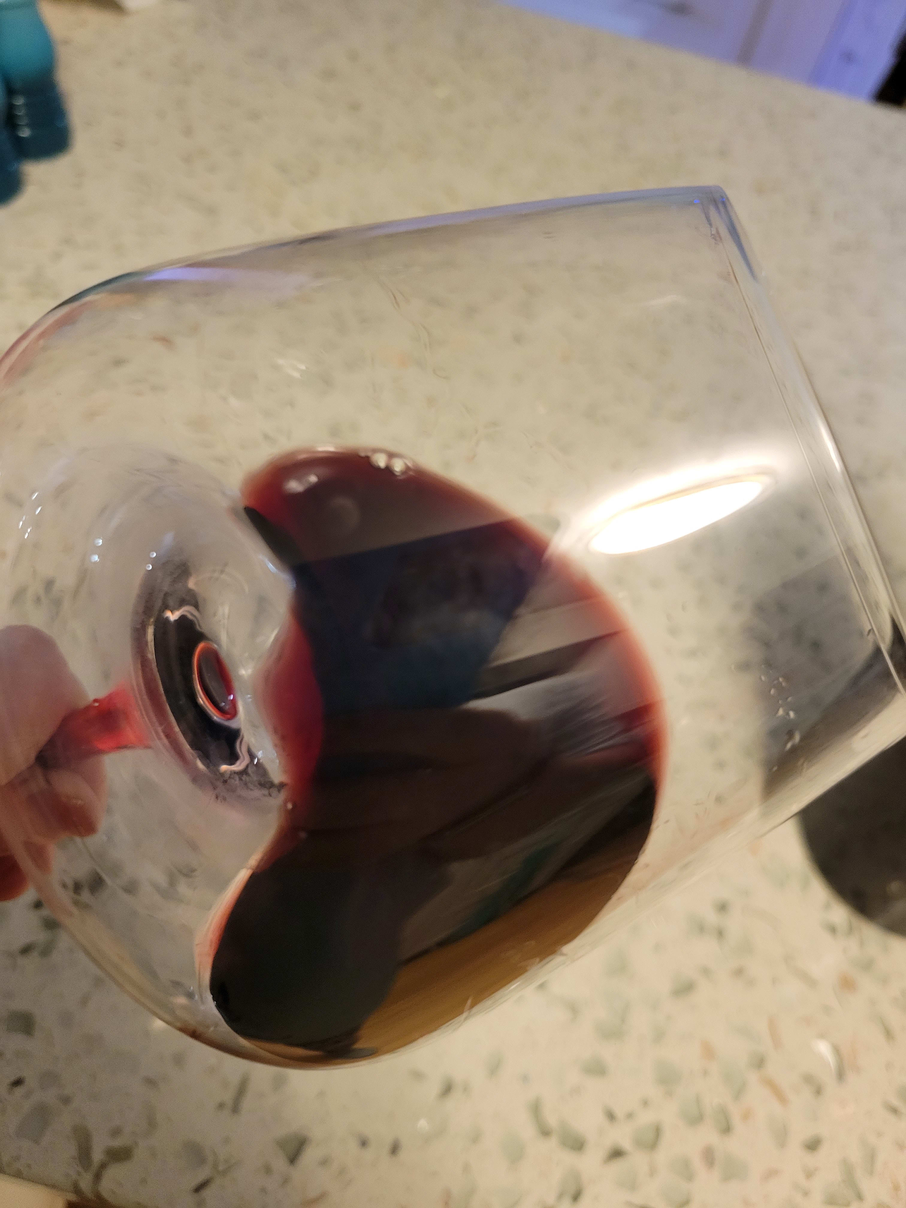 Red wine in a tilted wine glass