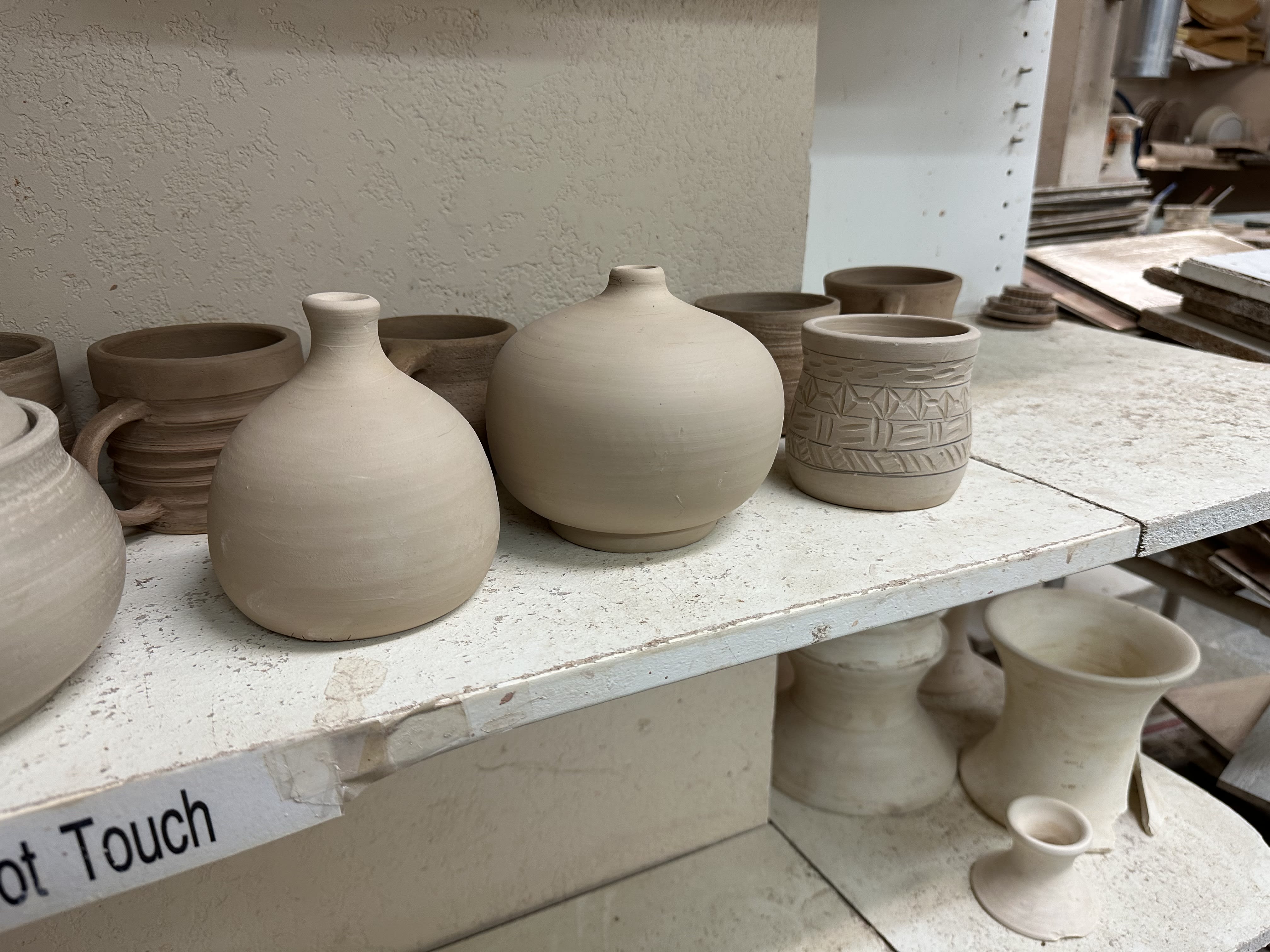 Three round vases