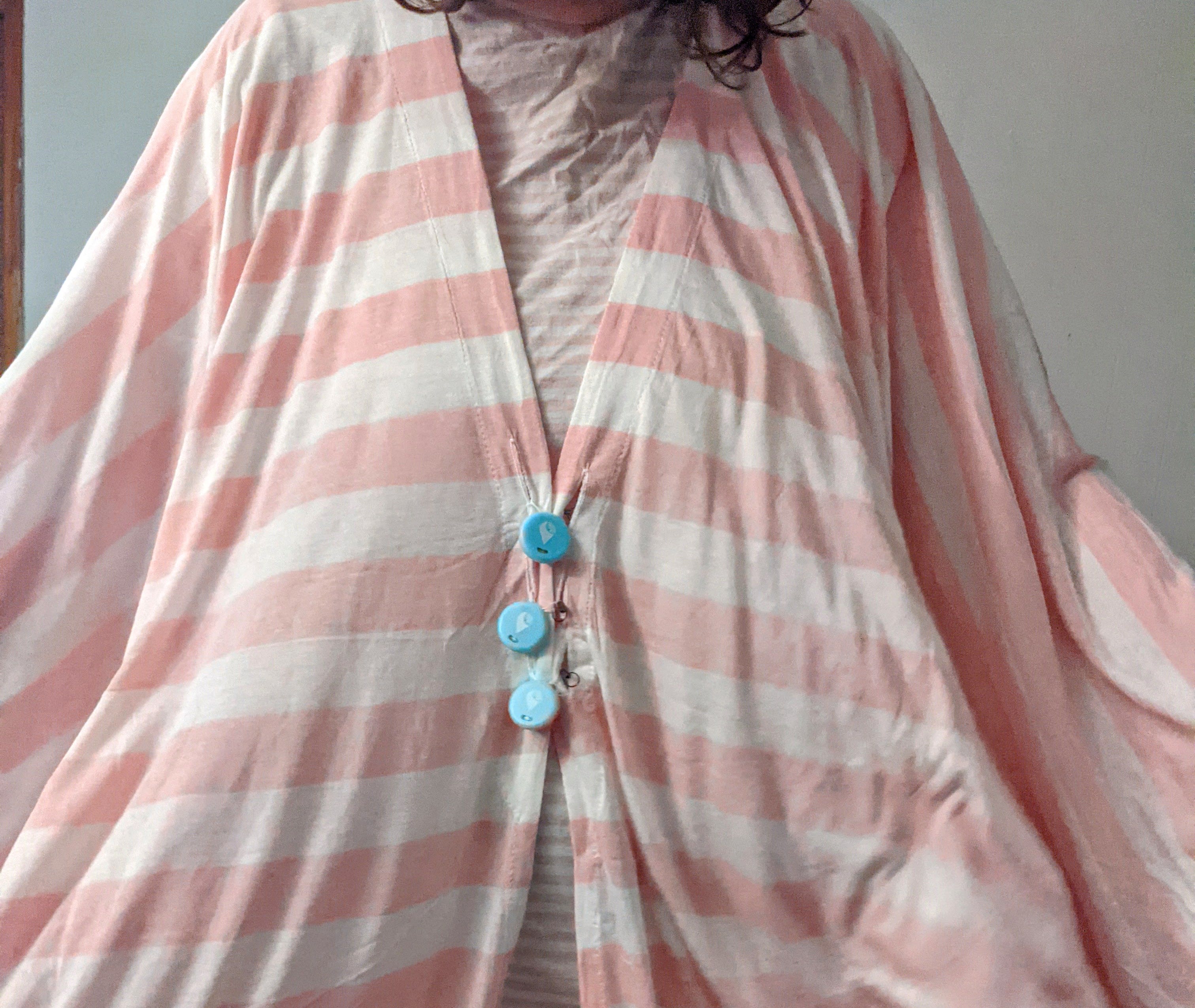 poncho with "buttons"