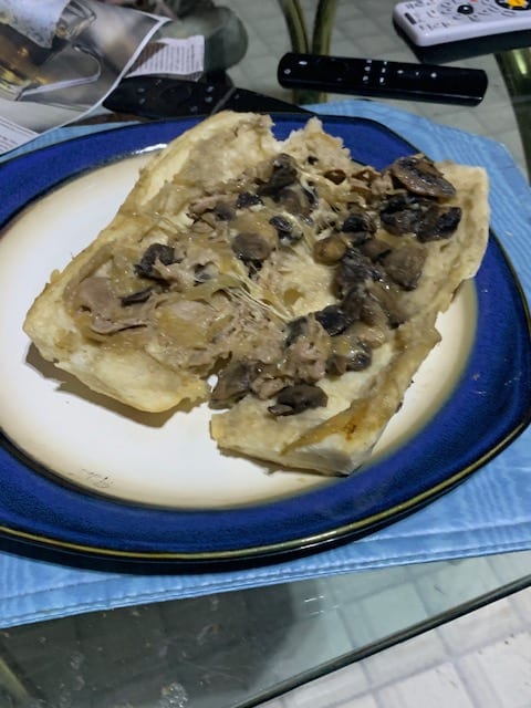 Homemade mushroom cheesesteak sandwich