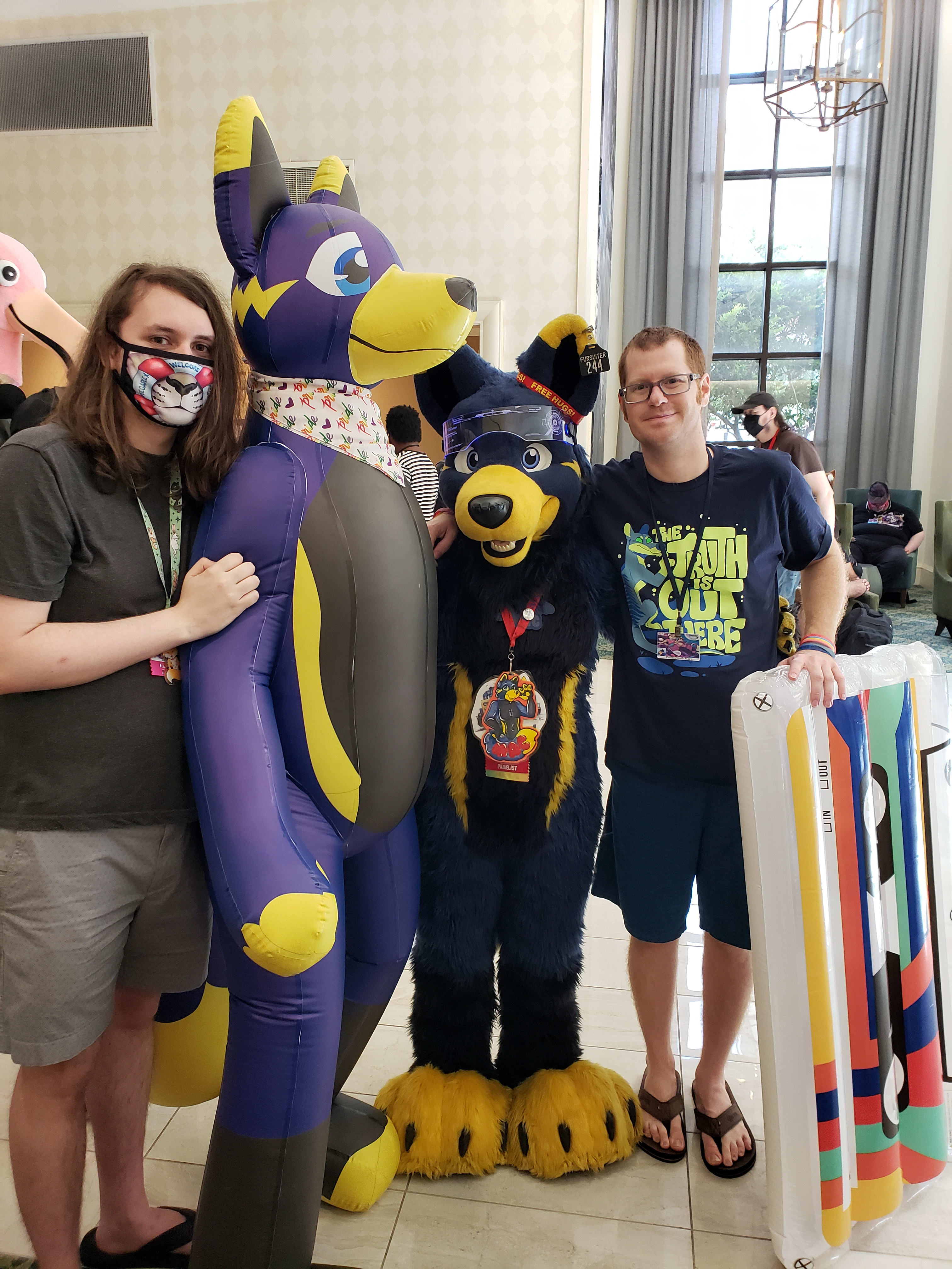 Left to right: my fiancé, Mactoy, Mom in my fursuit, and me!