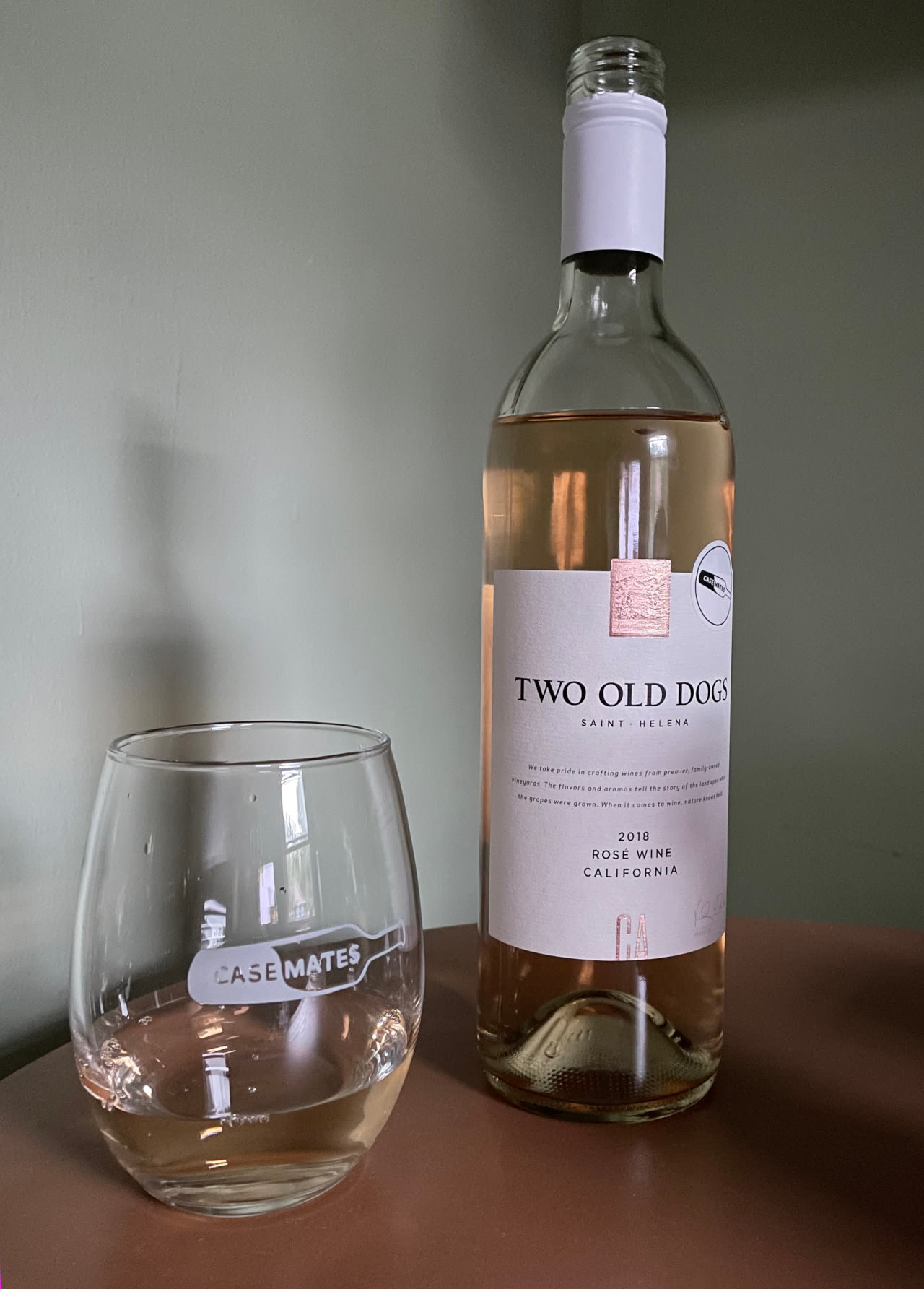 Two Old Dogs rosé bottle and Casemates glass