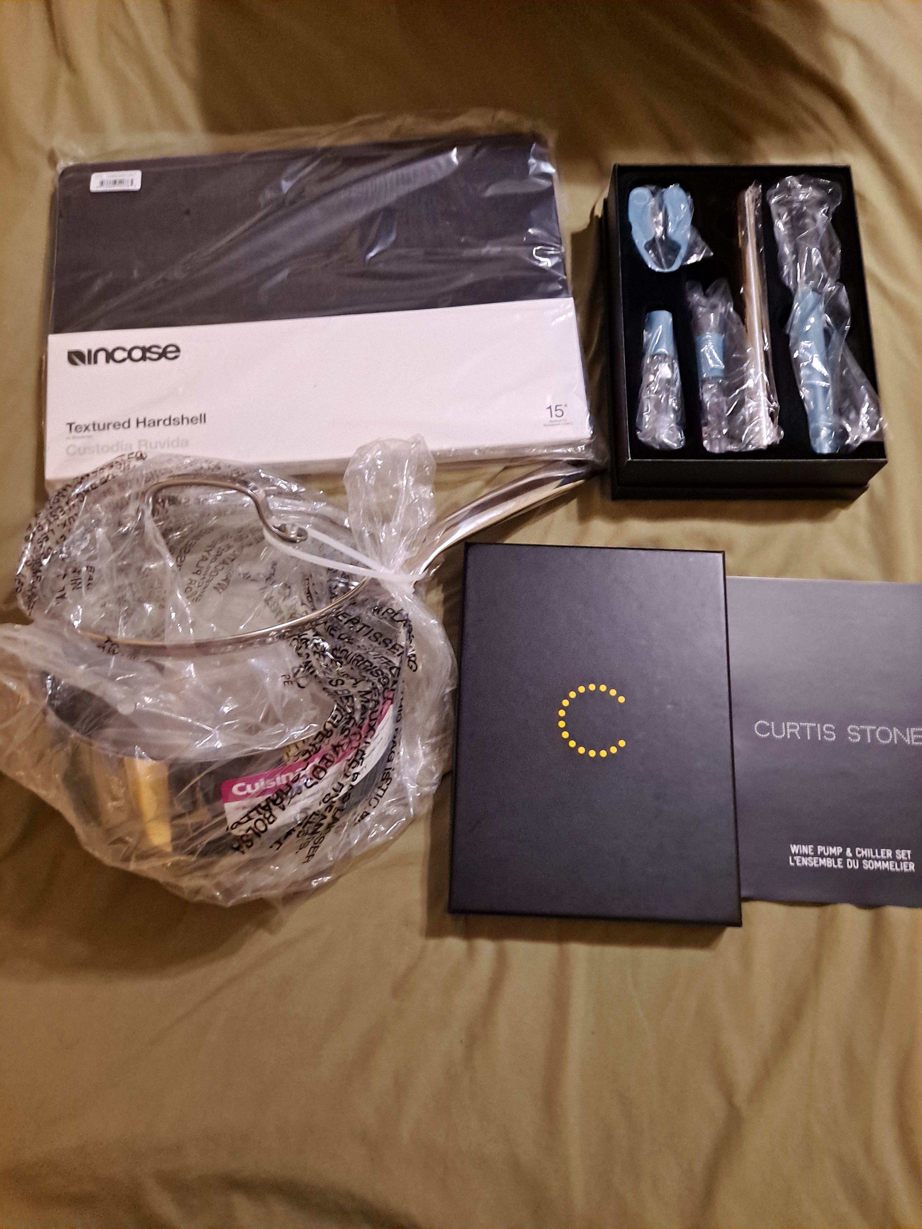 Wine accessory, apple laptop case, Cuisinart cooking pot