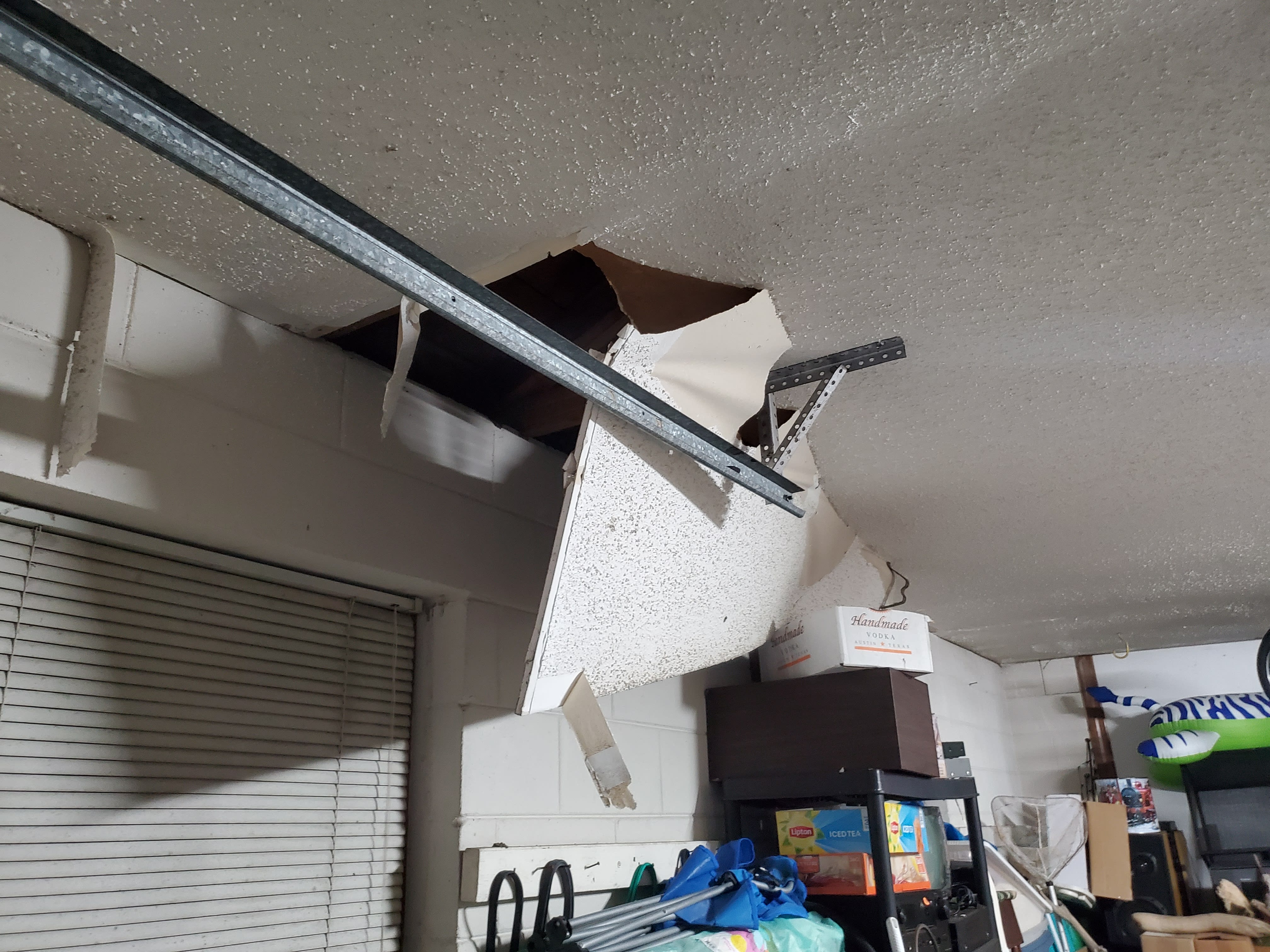 Drywall ceiling damage in garage