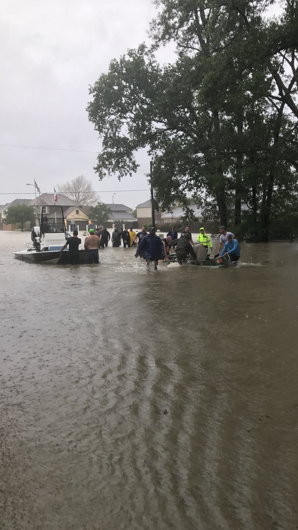 parents being rescued in a canoe