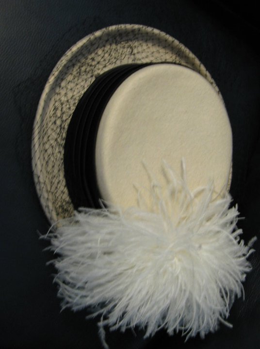 white felt veil feather