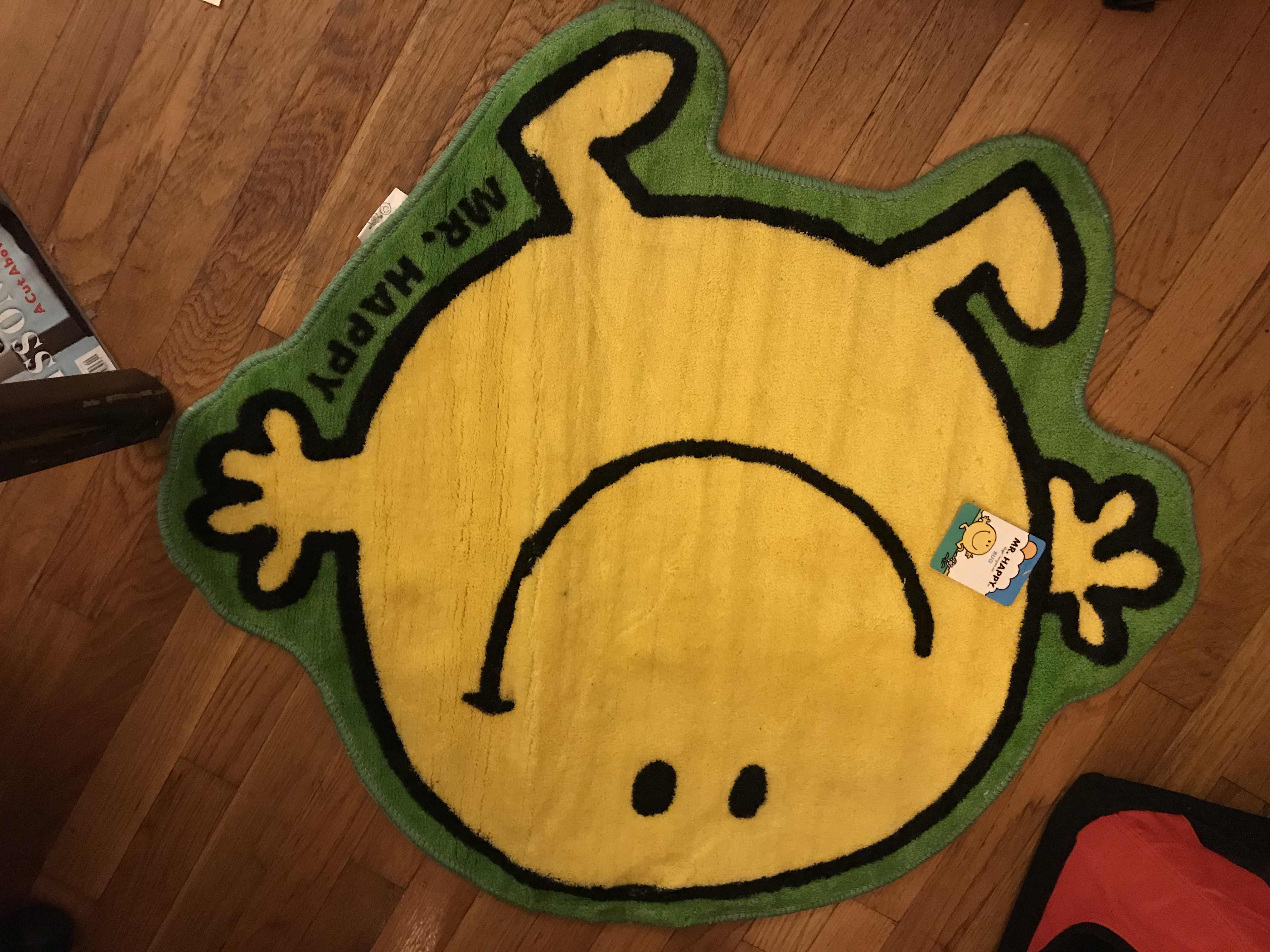 a Mr. Happy rug
