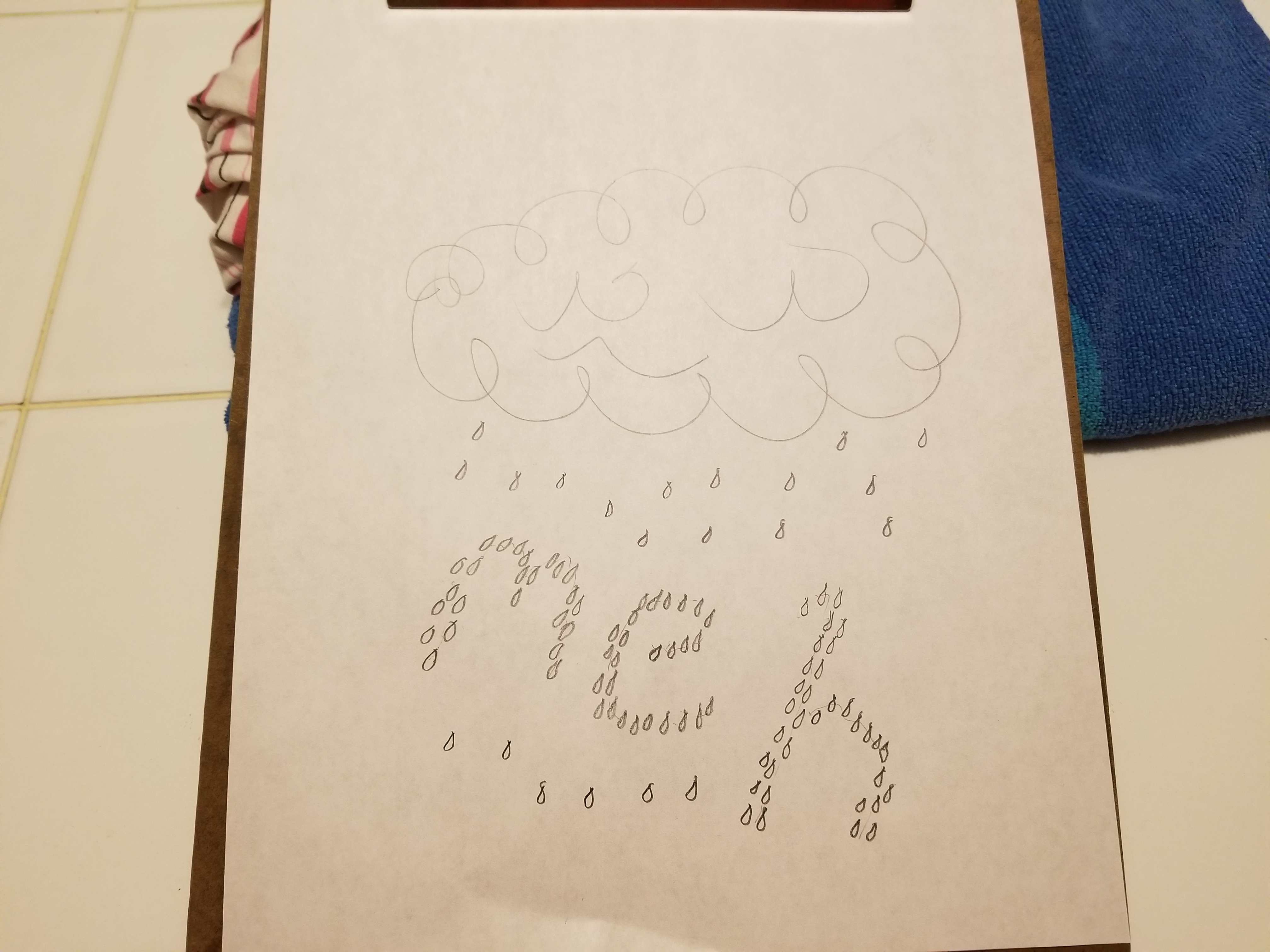 picture the cloud and rain in white on a blue shirt